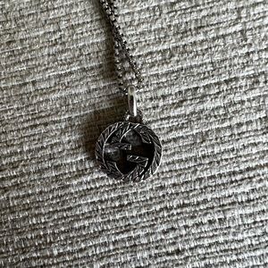 Authentic Gucci interlocking G charm with chain included